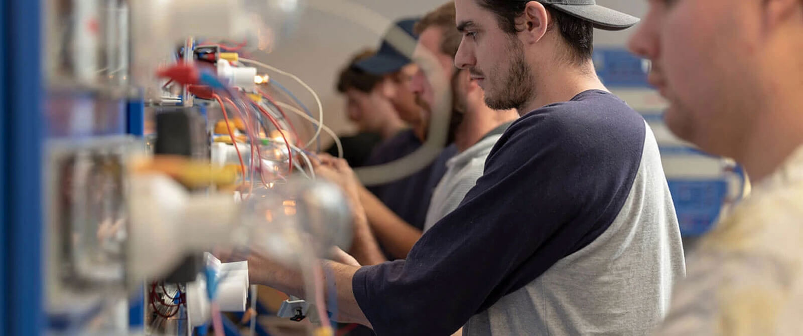Electrical apprentice learning how to wire