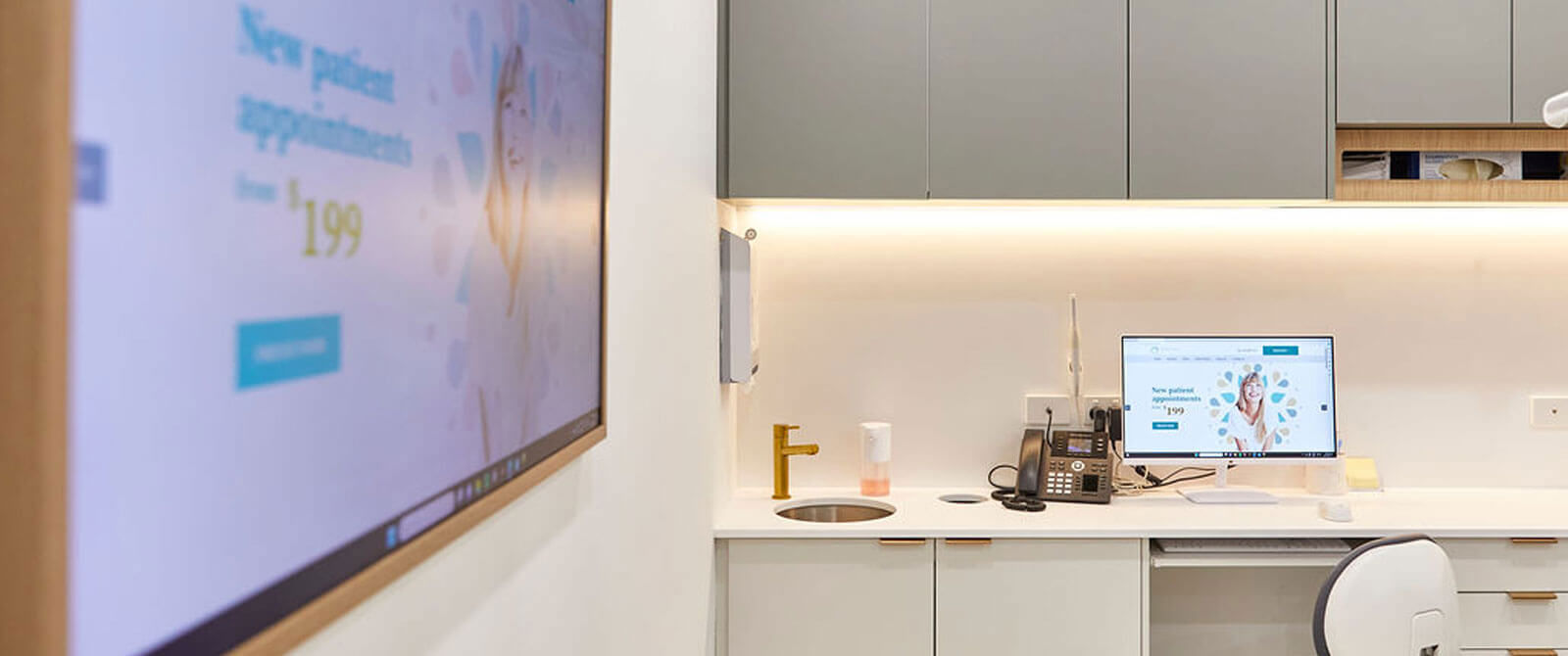 Nedlands Dental website up on a screen at the practice