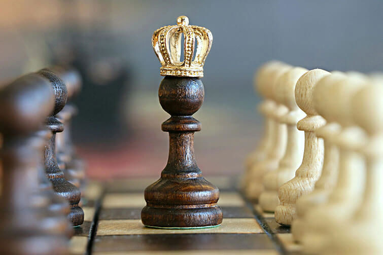 Chess pawn with crown