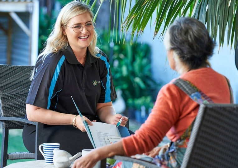 Brightwater care worker smiling at a resident